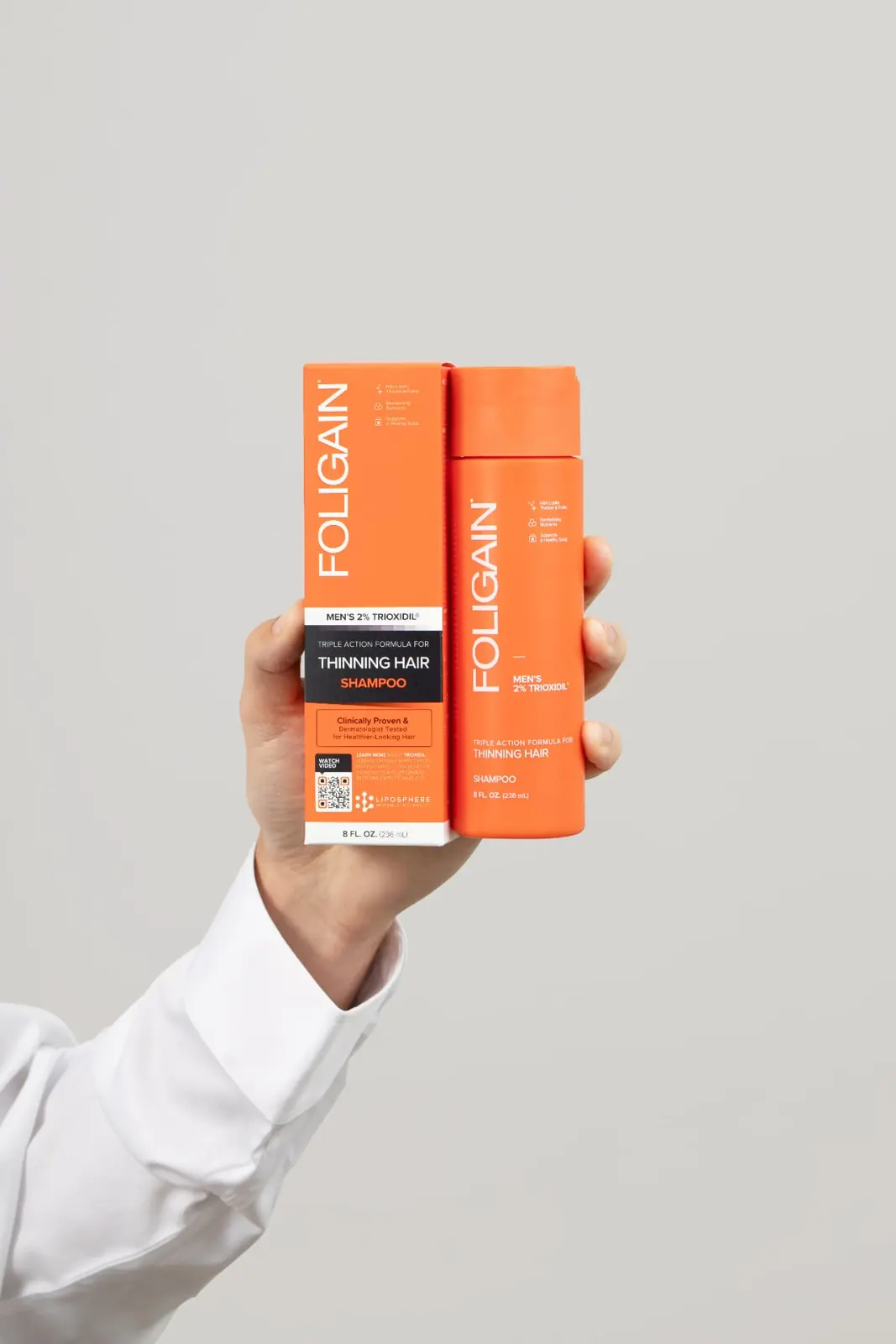FOLIGAIN® men's thinning hair shampoo and box